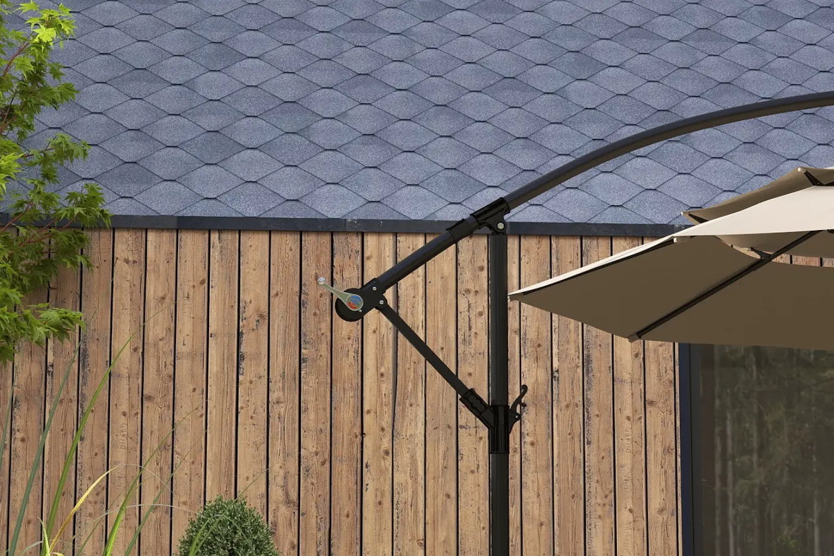 Patio umbrella attached to a wall-mounted bracket against a wooden fence and blue roof.