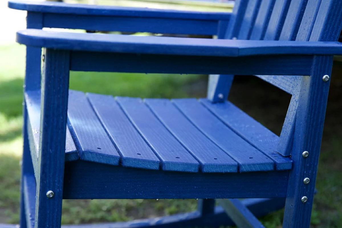 Blue wooden chair with a blurred green background