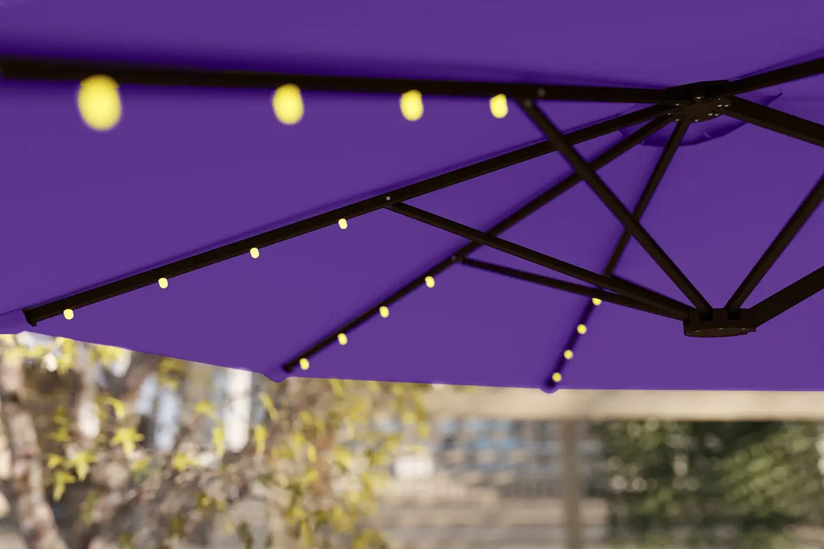 Purple patio umbrella with string lights against a blurred outdoor background