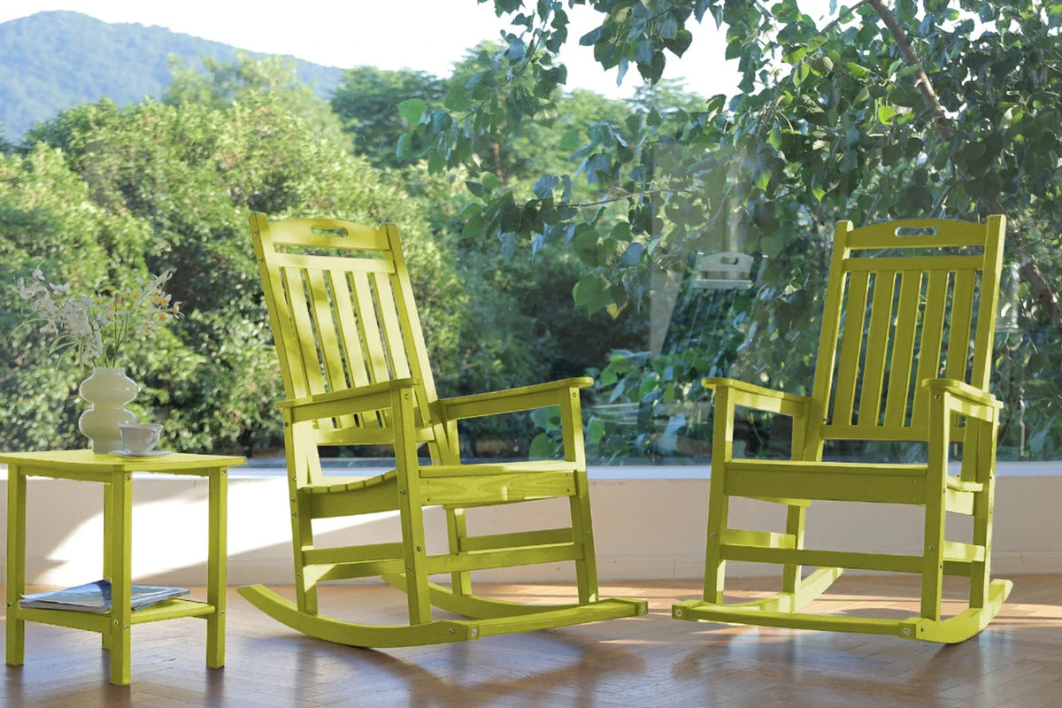 Two bright green rocking chairs on a wooden floor with a blurred natural background