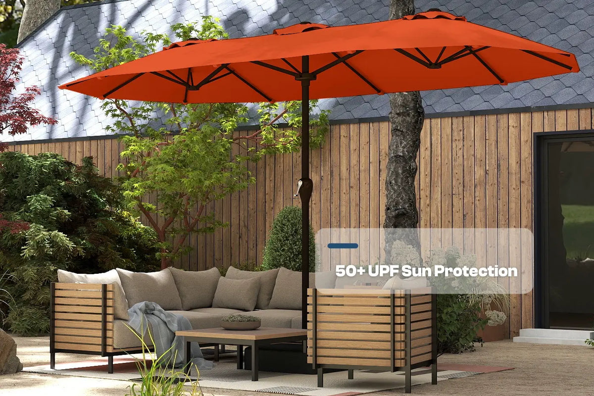 Orange patio umbrella providing 50+ UPF sun protection over outdoor furniture.
