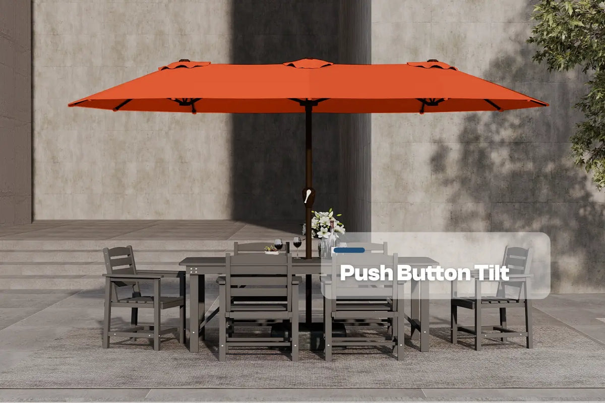 Orange patio umbrella with push button tilt feature over a dining set on a patio.