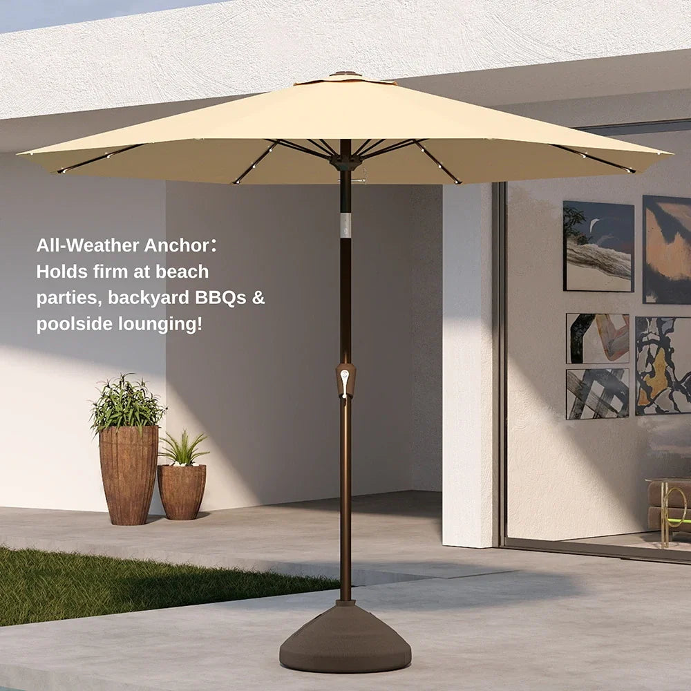 Beige patio umbrella with all-weather anchor on a patio setting