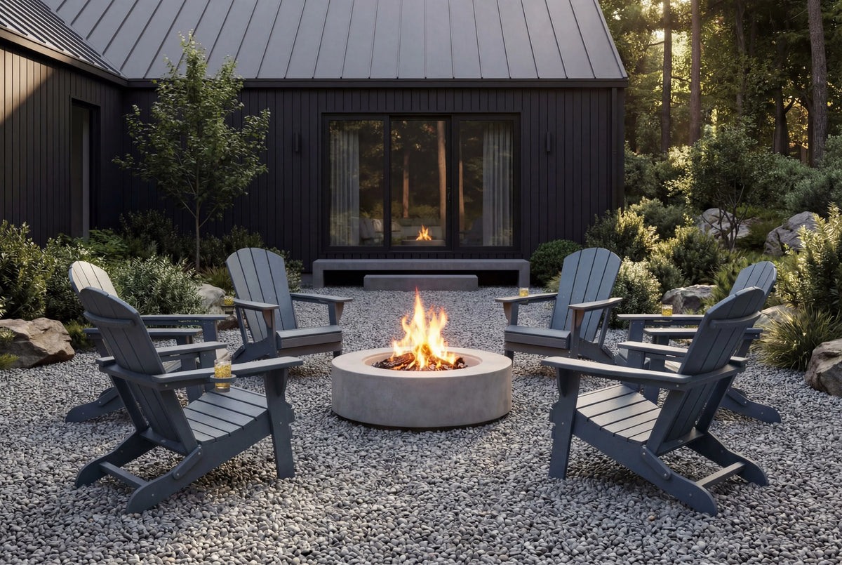 Outdoor setting with Adirondack chairs around a fire pit in front of a cabin.