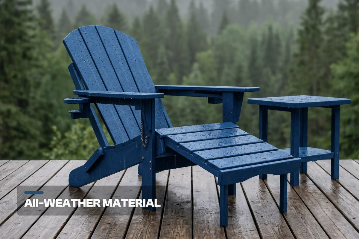 A navy blue outdoor Adirondack chair with a matching side table on a wooden deck, with a forest background and the text 'ALL-WEATHER MATERIAL' in the lower left corner.