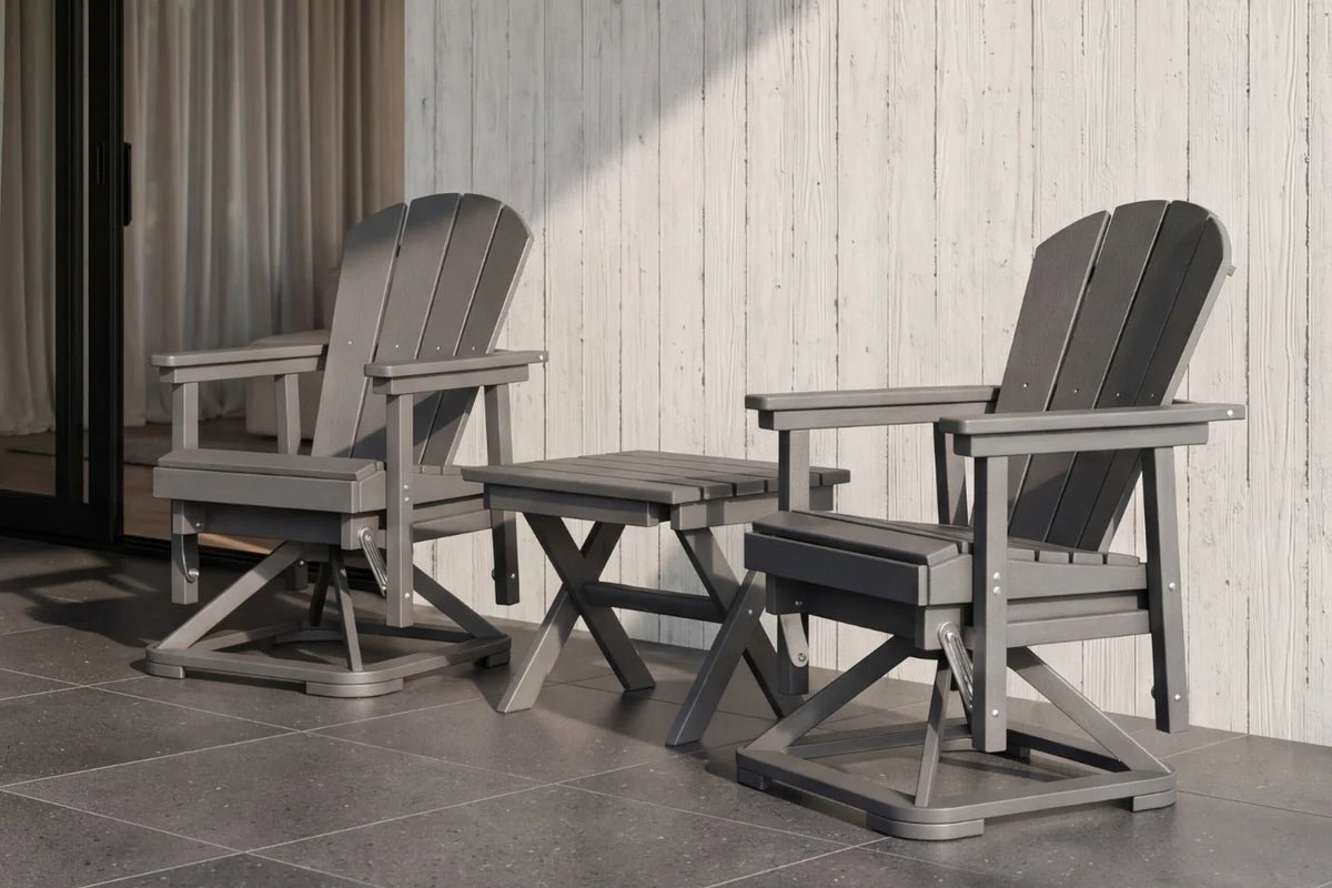 Two Adirondack chairs with a small table on a patio.