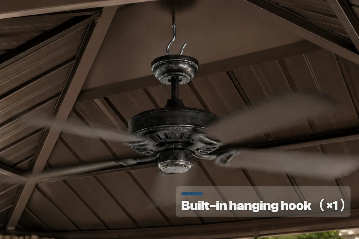 A dark metal five-blade ceiling fan hanging under a brown pavilion roof, with a text overlay that reads 'Built-in hanging hook (x1)'.