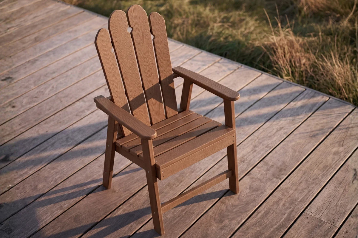Light brown HDPE chair on a wooden deck with grass in the background