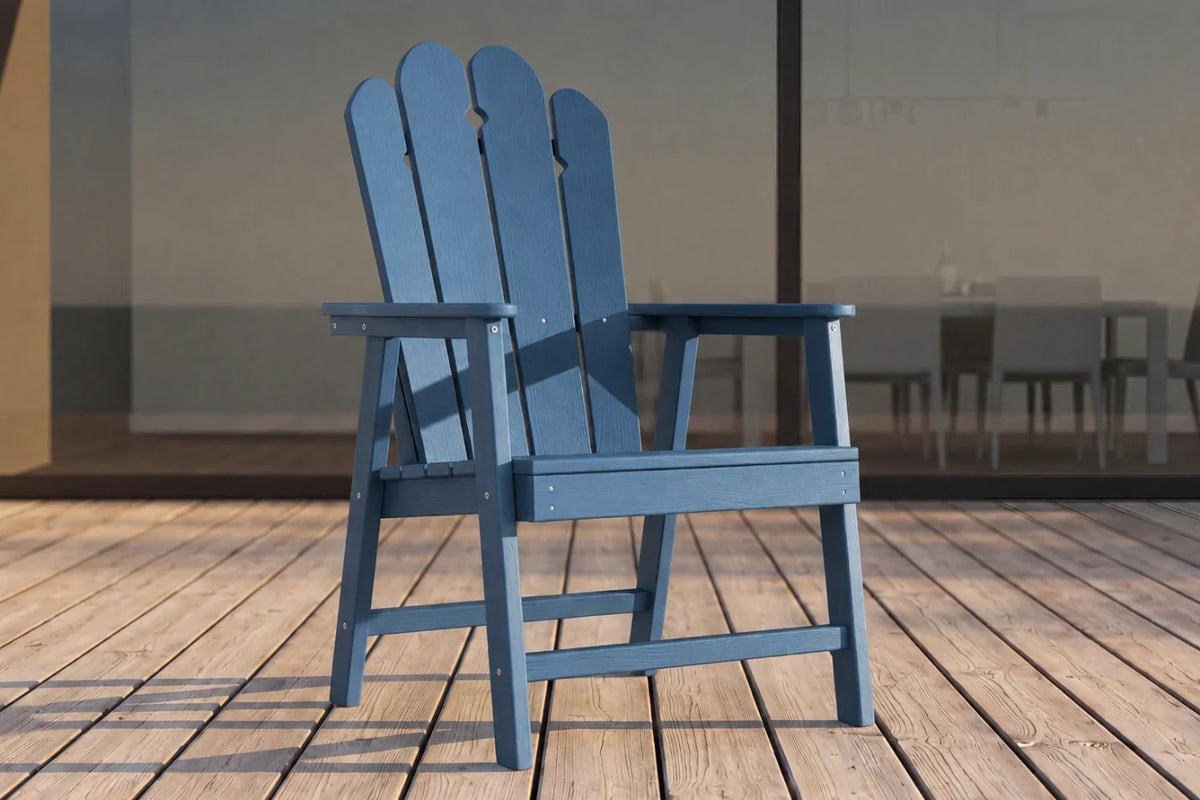 Navy blue HDPE chair on a wooden deck with a blurred background