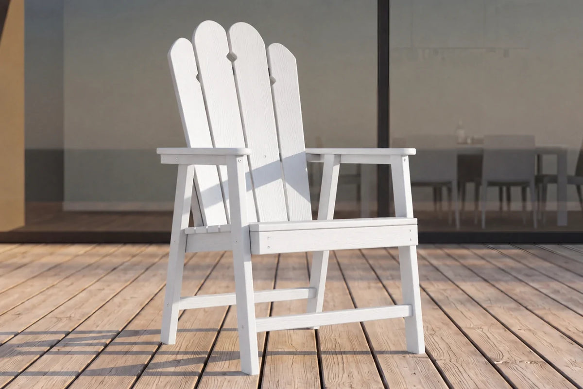 White HDPE chair on a wooden deck with a blurred background