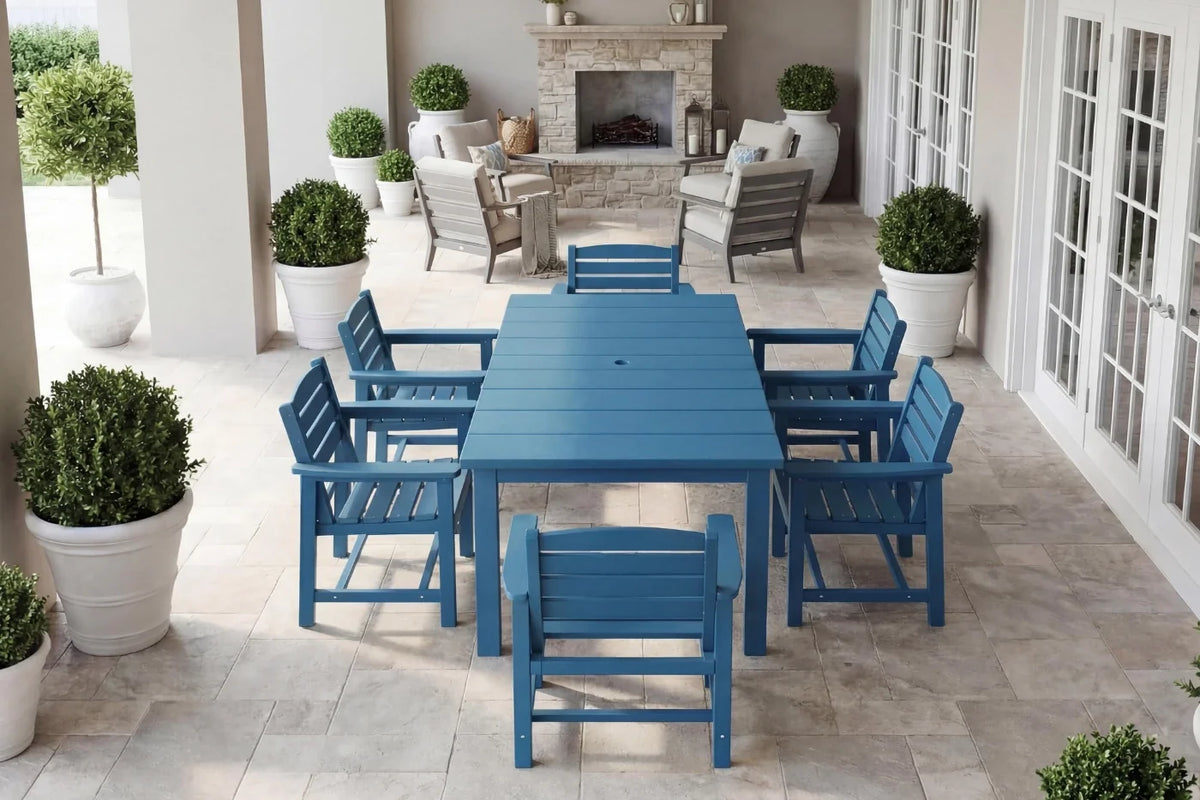 Blue outdoor dining set with chairs on a patio area.
