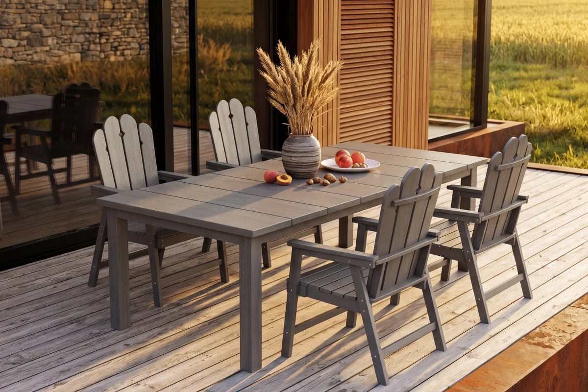 Gray Outdoor dining set with table and chairs on a wooden deck.