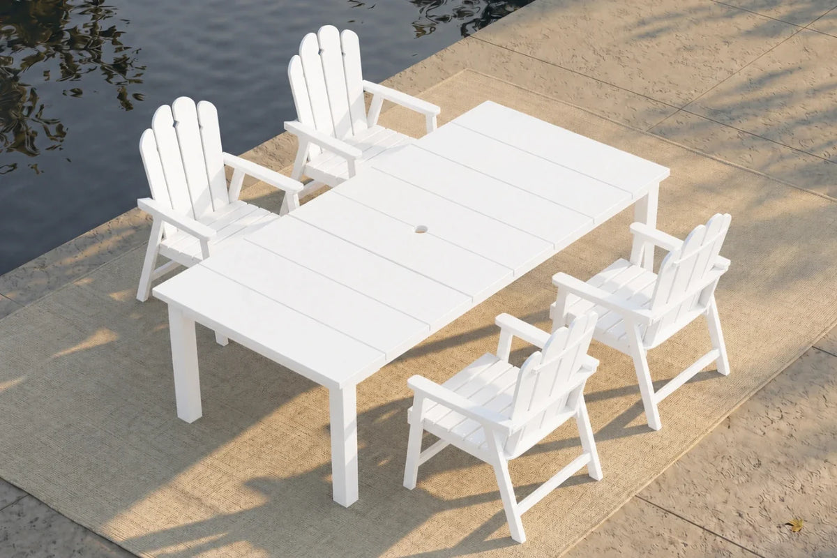 White outdoor furniture set with table and 4 chairs on a dock by water