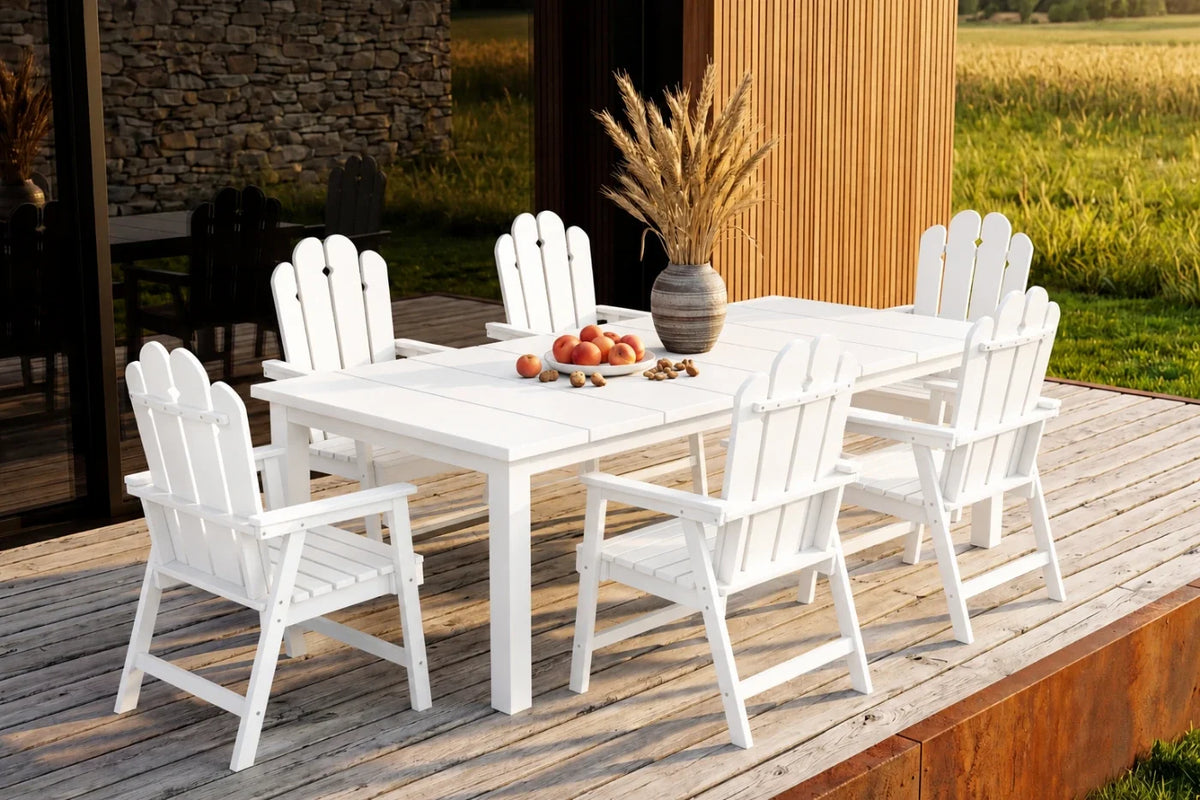 White outdoor dining set with table and chairs on a wooden deck.