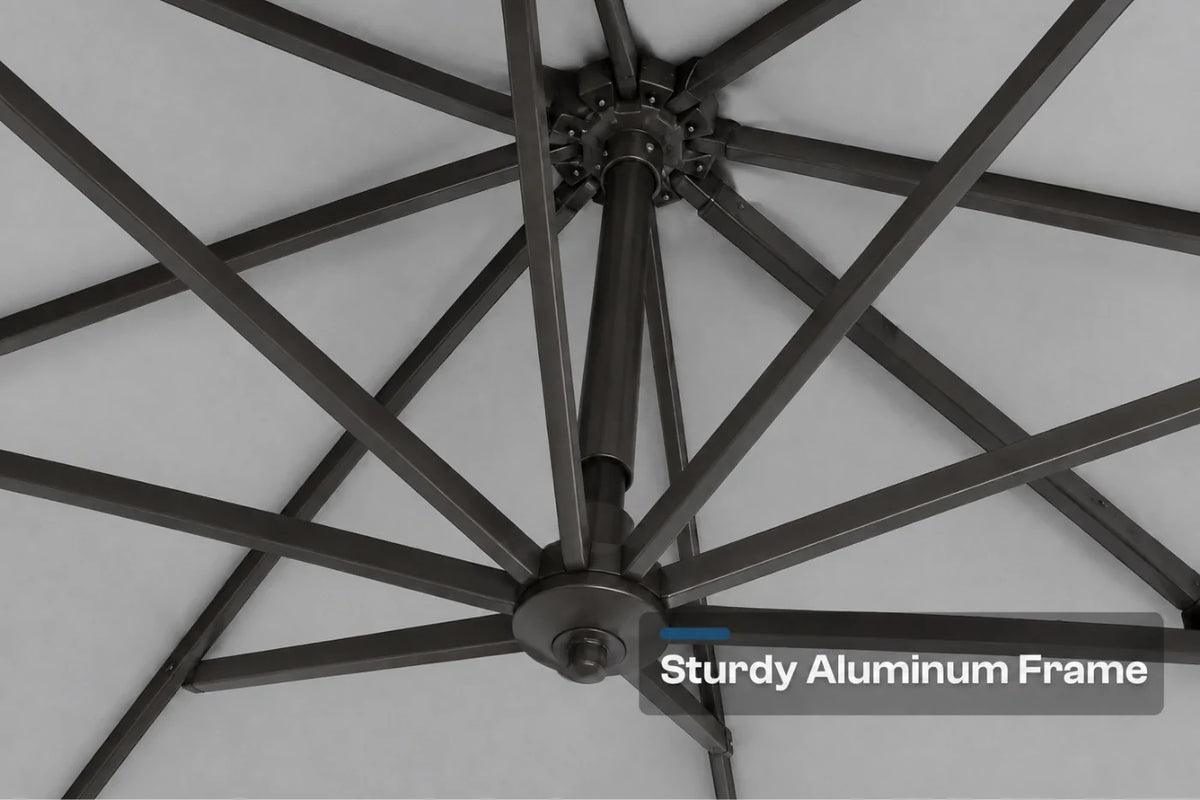 Close-up of a black aluminum patio umbrella frame with radiating ribs against a gray canopy background, with a text overlay reading 'Sturdy Aluminum Frame'.