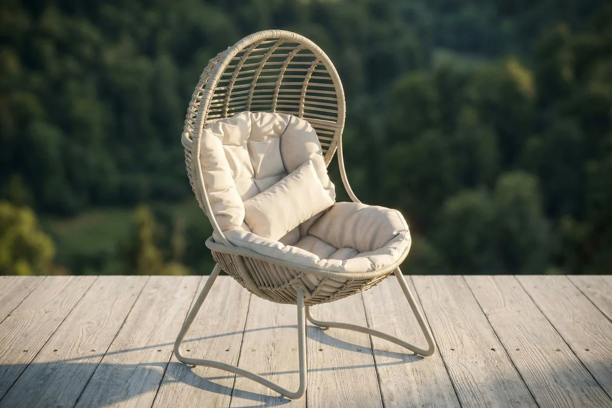 Wicker chair with cushion on a wooden deck with a forest background