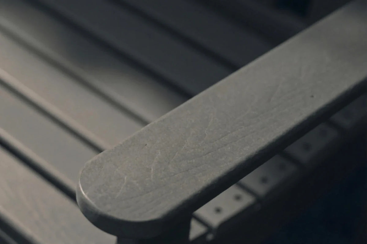 Close-up of a metal bracket on a dark background