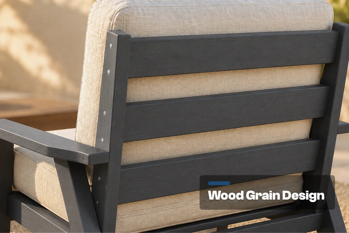 Close-up of the back of an outdoor armchair with a dark gray slatted frame and creamy white textured cushions. A text overlay reads 'Wood Grain Design'.