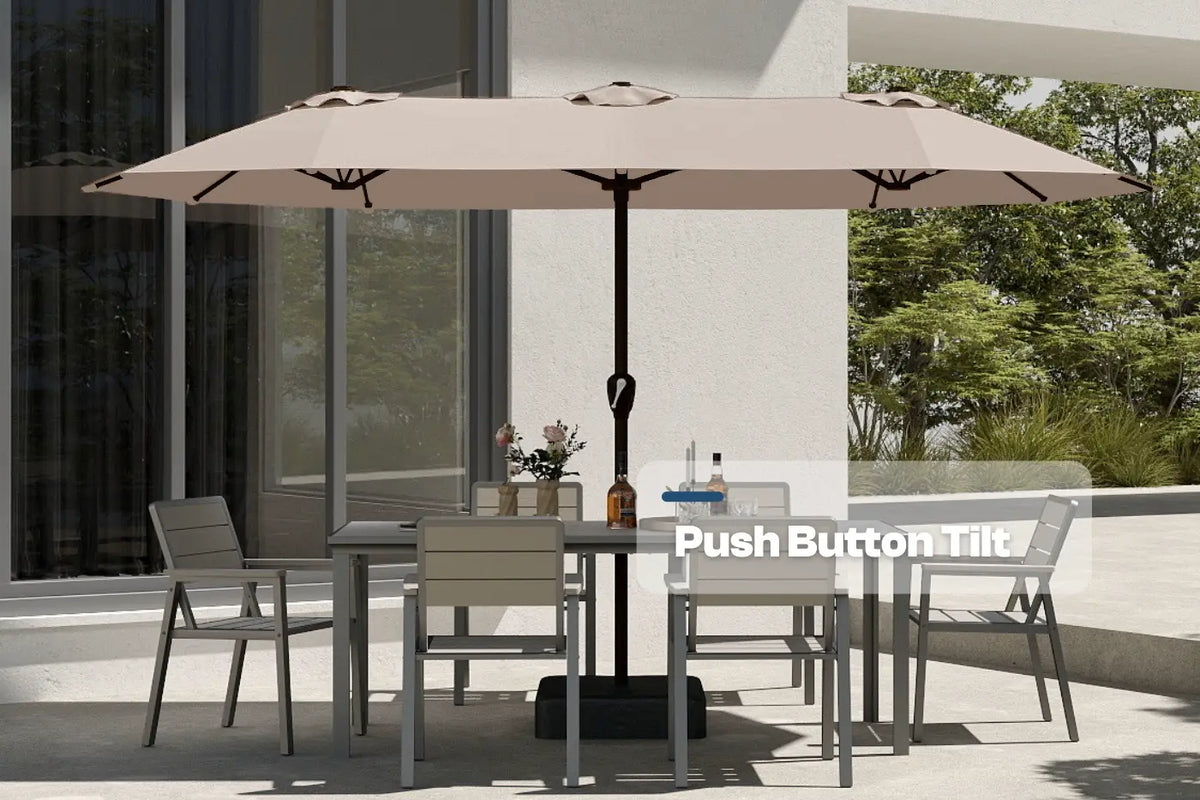 Outdoor patio set with a large umbrella on a modern patio.