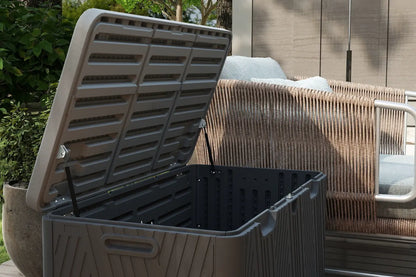 Outdoor trash bin with open lid in a garden setting