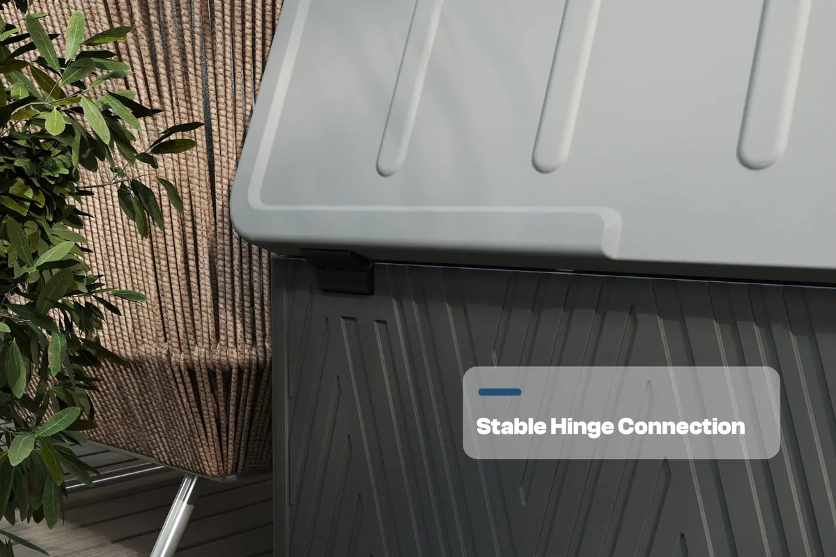Gray storage bin with a stable hinge connection label on a wooden surface.