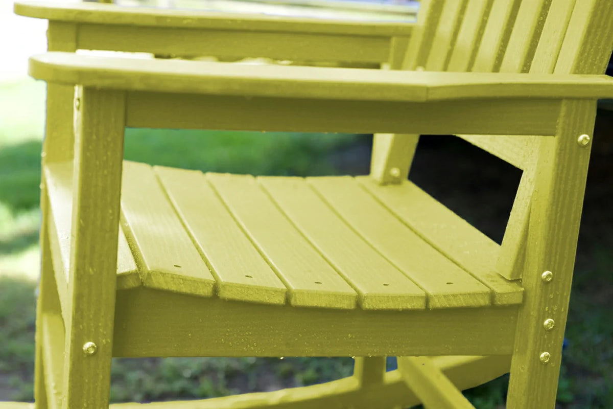 Yellow wooden chair with a blurred green background