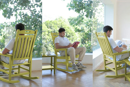 Man sitting on a yellow rocking chair in a bright room with large windows.