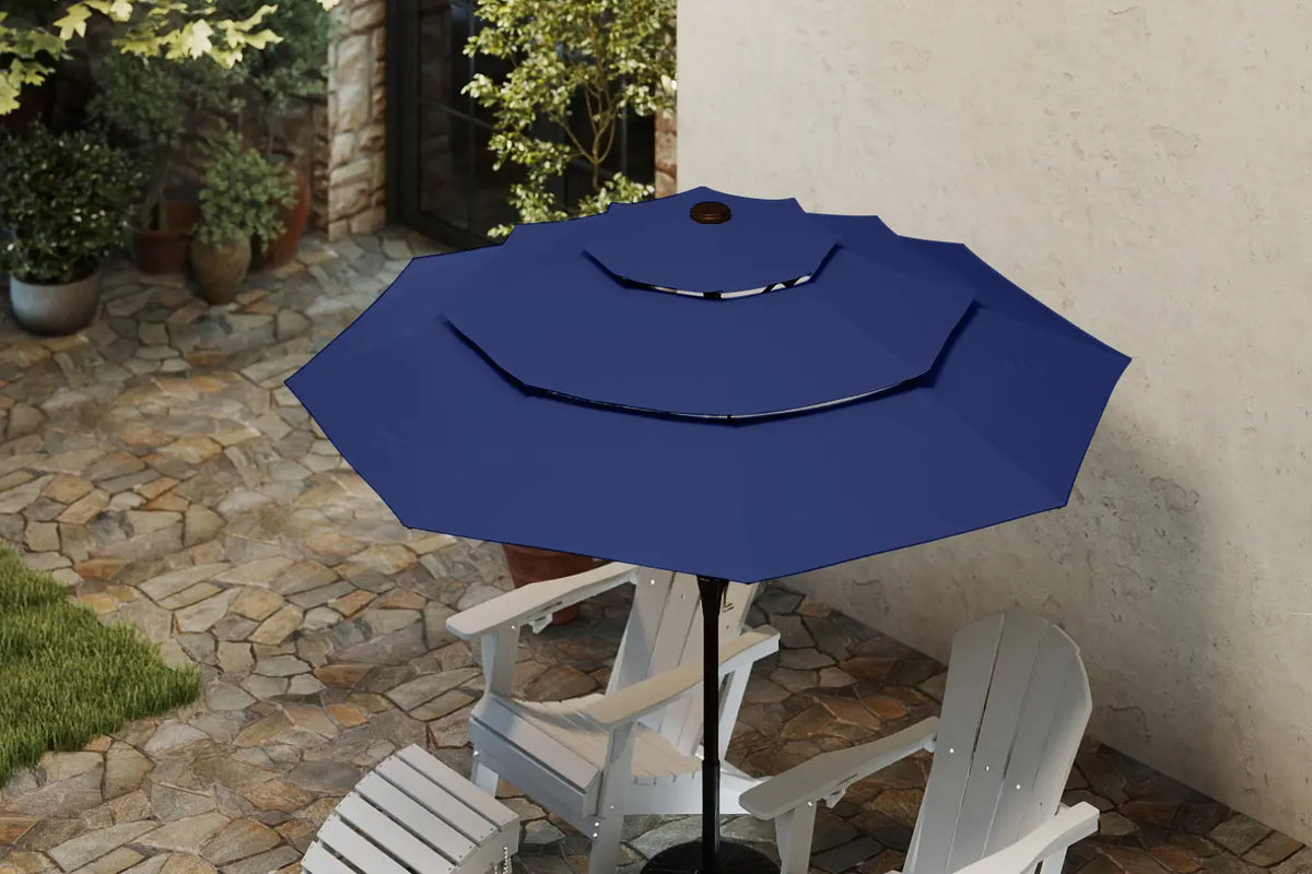 Blue patio umbrella on a stand with white chairs in a garden setting