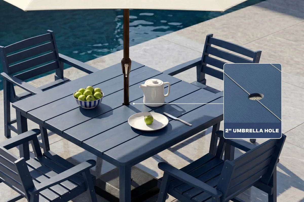 Blue Outdoor patio set with table, chairs, and umbrella hole feature near a pool.