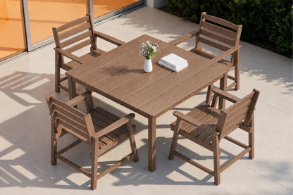 Brown  outdoor dining table with four chairs on a patio.
