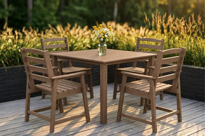 Brown outdoor dining set with table and chairs on a deck, featuring a vase of flowers.