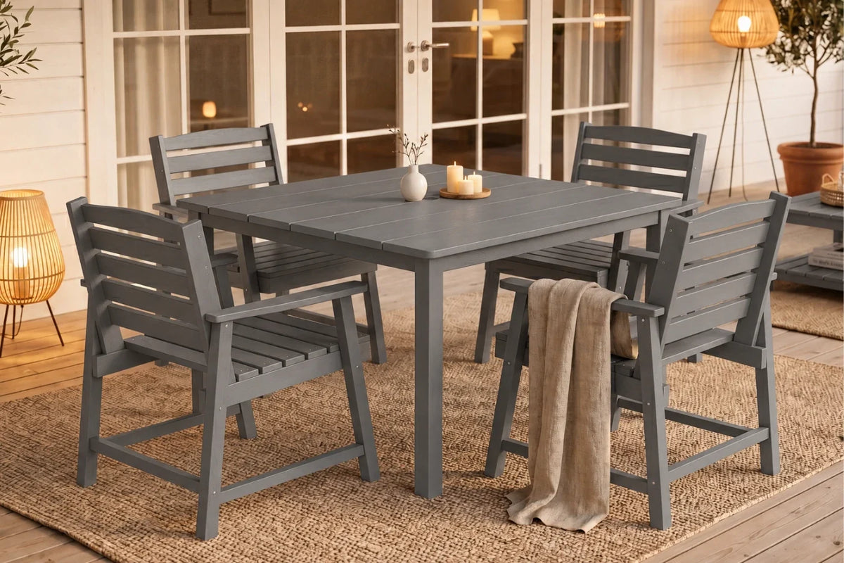 Gray outdoor dining set with table and 4 chairs on a patio.