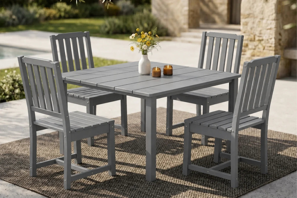 Gray outdoor dining set with table and 4 chairs on a patio