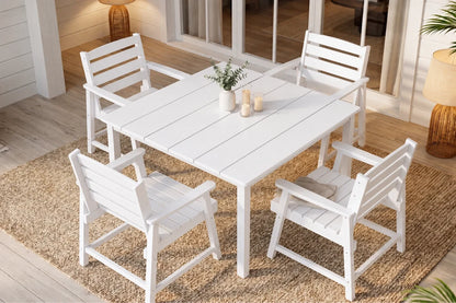 White outdoor dining table with four matching chairs on a wooden floor.