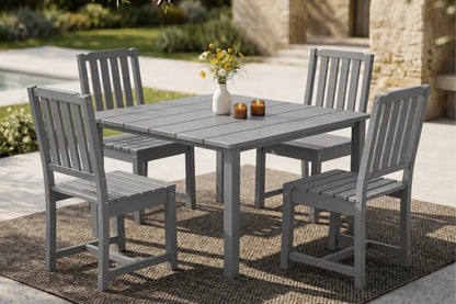 Gray outdoor dining set with table and 4 armless chairs on a patio