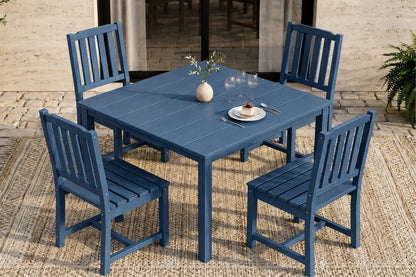 Blue outdoor dining set with table and 4 armless chairs on a textured surface.