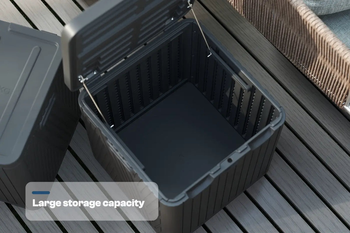 Black storage bin with lid on a wooden surface