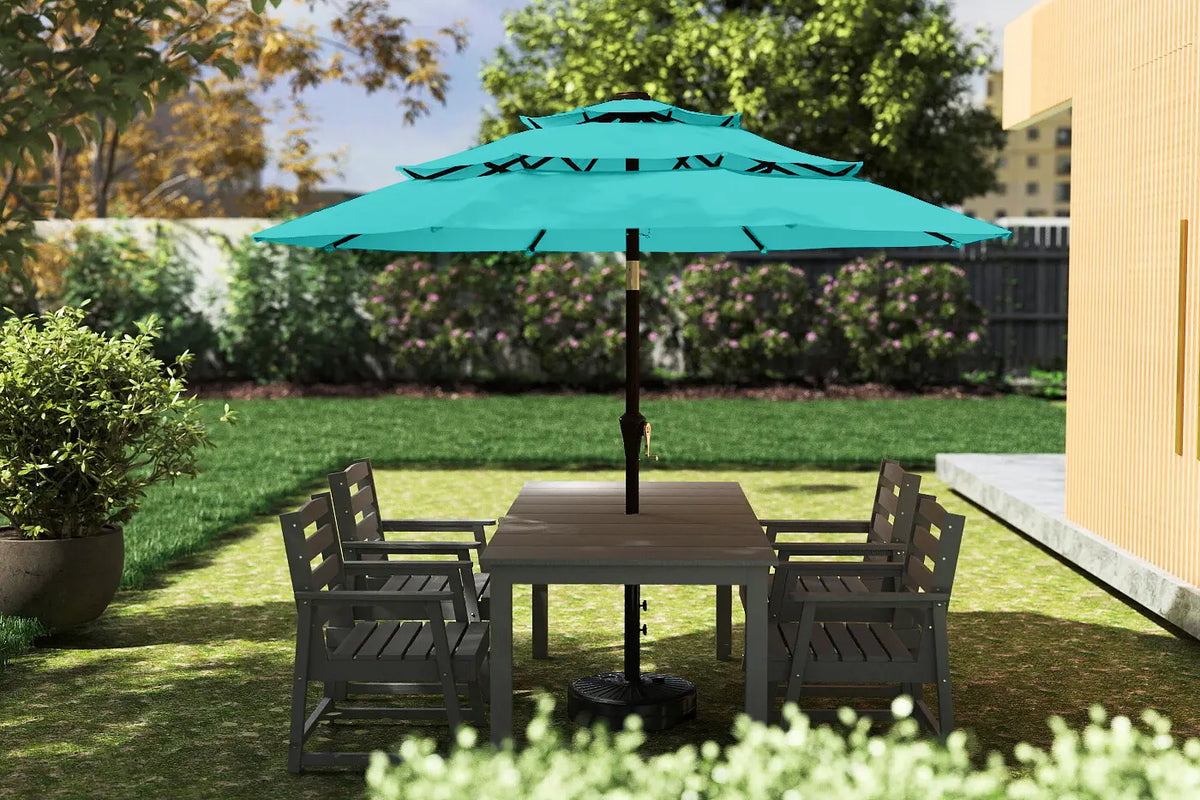 Outdoor patio set with a turquoise umbrella in a garden setting