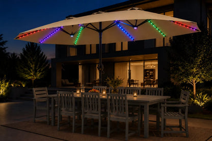 Outdoor patio umbrella with integrated RGB LED string lights glowing in red, green, blue, and purple, shading a wooden dining table and chairs in front of a modern house at dusk.