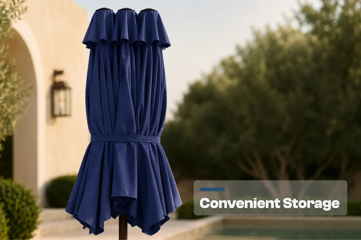 A navy blue closed patio umbrella with pleated fabric, shown outdoors in front of a house and trees. A text overlay on the right reads 'Convenient Storage'.