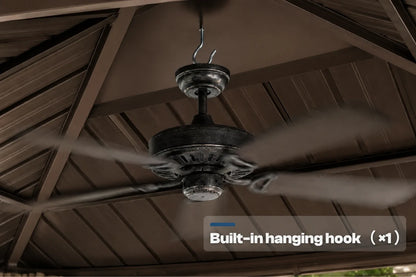 A dark metal five-blade ceiling fan hanging under a brown pavilion roof, with a text overlay that reads 'Built-in hanging hook (x1)'.