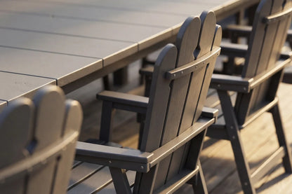 Dark gray Wave™ All-Weather HDPE Outdoor Dining Set on a deck