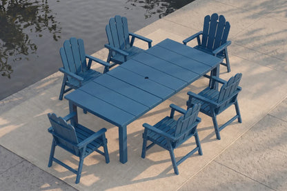 Navy blue outdoor table with six matching chairs by a body of water.