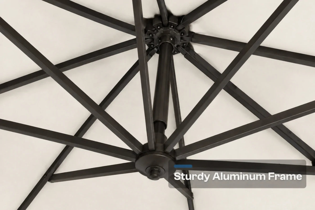 Close-up of a black aluminum patio umbrella frame with radiating ribs against a creamy white canopy background, with a text overlay reading 'Sturdy Aluminum Frame'.