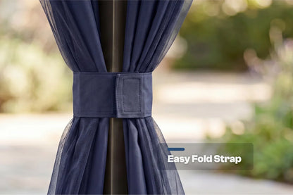 Navy blue curtain with an easy fold strap against a blurred outdoor background