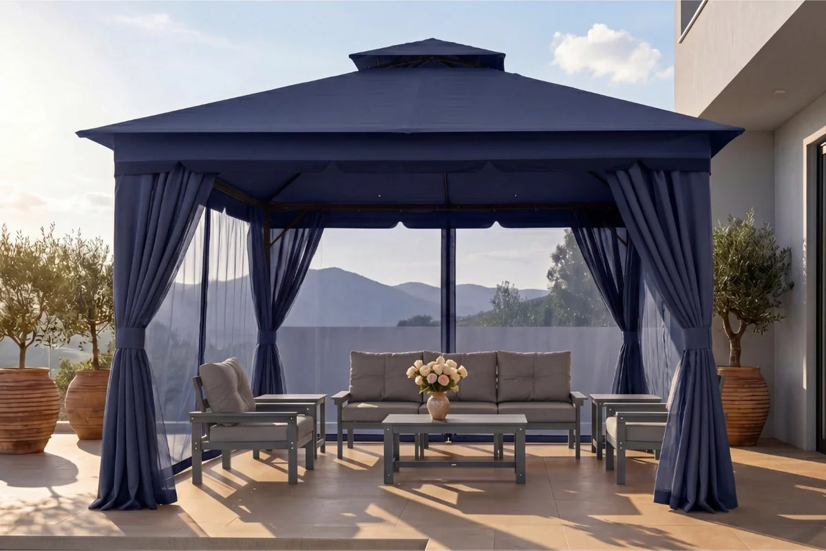 Outdoor gazebo with curtains, furniture, and a scenic view.