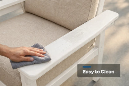 A close-up of a person's hand wiping down a white armrest of a creamy white outdoor chair with a gray cloth, with an 'Easy to Clean' text overlay.