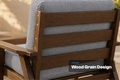 Close-up of the back of a outdoor chair with gray textured cushions and a text overlay reading 'Wood Grain Design'.